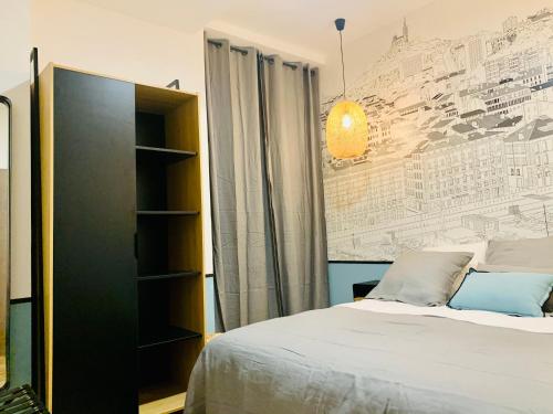 Letto o letti in una camera di Le Phocéen : T4 balcon vue Vieux-Port