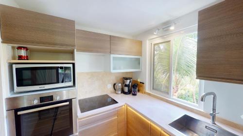 Cucina o angolo cottura di Hotel Les Ondines Sur La Plage