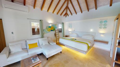 Letto o letti in una camera di Hotel Les Ondines Sur La Plage