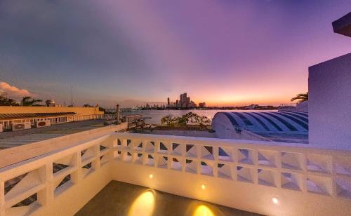 a view of the water from a balcony of a building at Lunalá Hotel Boutique in Cartagena de Indias