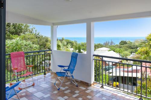 Foto Maison confortable avec vue sur mer à Sainte-Rose + jardin 1