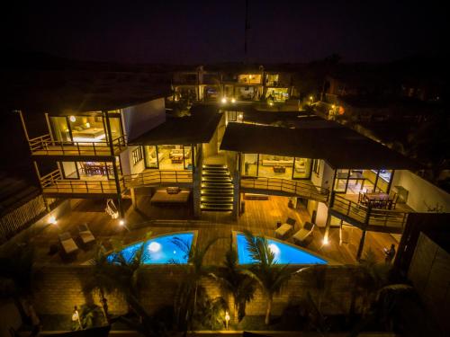 an overhead view of a pool at night at Casas Lua & Mar - Vichayito - Máncora in Vichayito