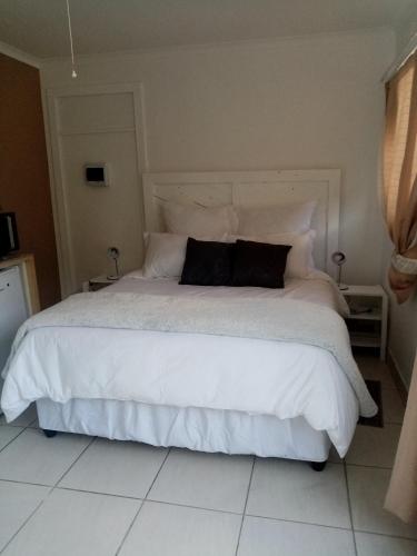 Ένα ή περισσότερα κρεβάτια σε δωμάτιο στο Lior-Gil accommodation-