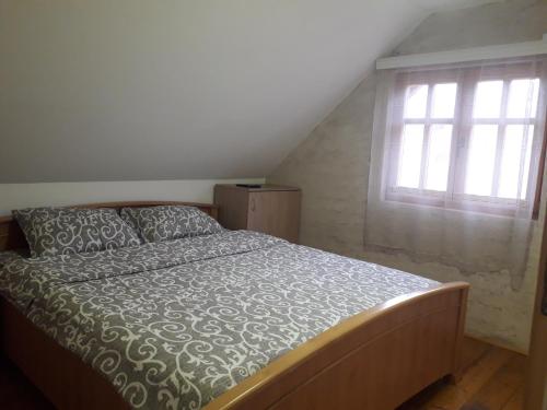 Un pat sau paturi într-o cameră la Stara Planina Stankovic