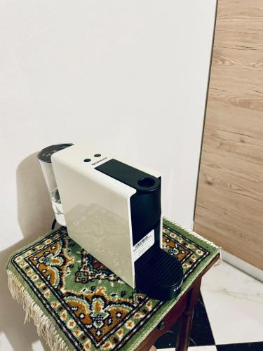 a computer monitor sitting on top of a table at CASA DEI FIORI in Somma Lombardo