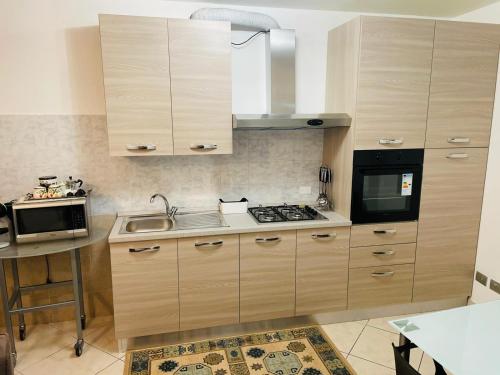 Kuchyň nebo kuchyňský kout v ubytování Casa Dei Fiori 3