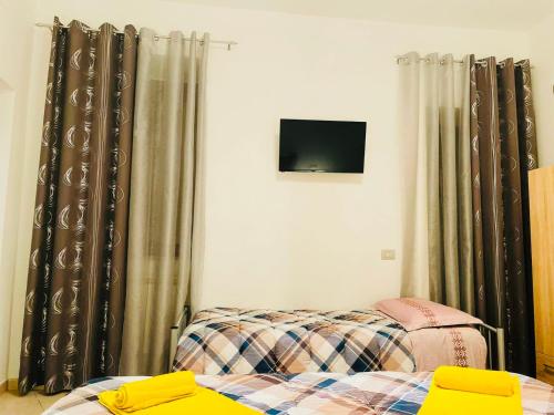 Postel nebo postele na pokoji v ubytování Casa Dei Fiori 3