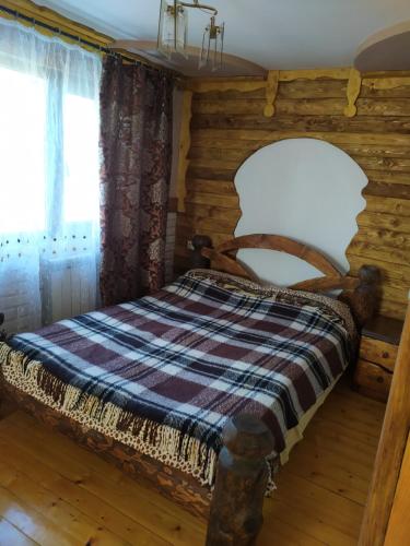 Ліжко або ліжка в номері Dobryi Hutsul