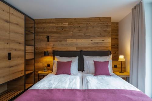 Ένα ή περισσότερα κρεβάτια σε δωμάτιο στο 22 Summits Apartments