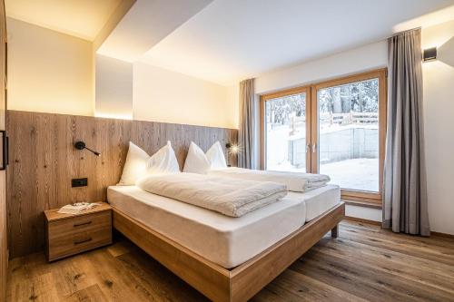 Ein Bett oder Betten in einem Zimmer der Unterkunft Niciora