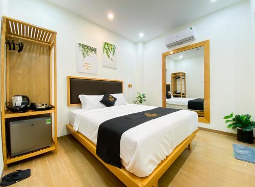 Säng eller sängar i ett rum på ZELDA hotel