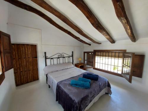 Postel nebo postele na pokoji v ubytování Luby Cortijo Las Eras