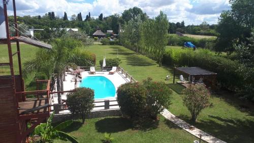 Bazén v ubytování Cabañas Los Teros nebo v jeho okolí