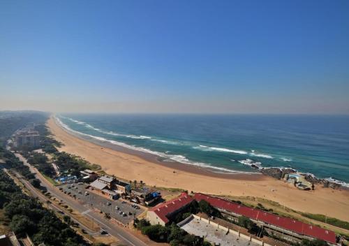 an aerial view of a beach and the ocean at Sea Views at High Tide 1803 in Amanzimtoti