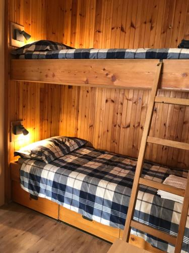 Tempat tidur susun dalam kamar di Bardonecchia Holidays