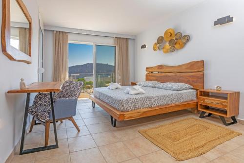 Posteľ alebo postele v izbe v ubytovaní Lindos Villa Agape