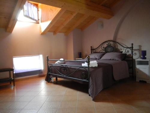 Postel nebo postele na pokoji v ubytování La Cascina del Sole