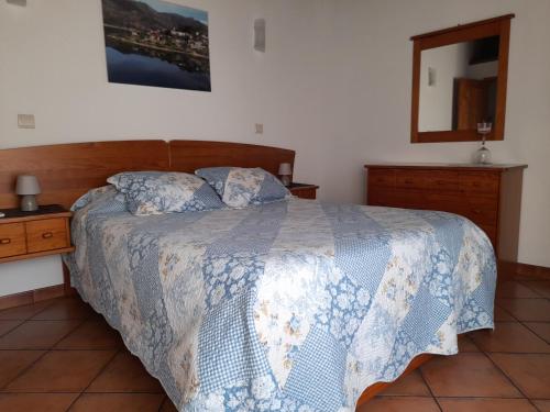 Łóżko lub łóżka w pokoju w obiekcie Quinta da Fonte da Poça - Chalé T1