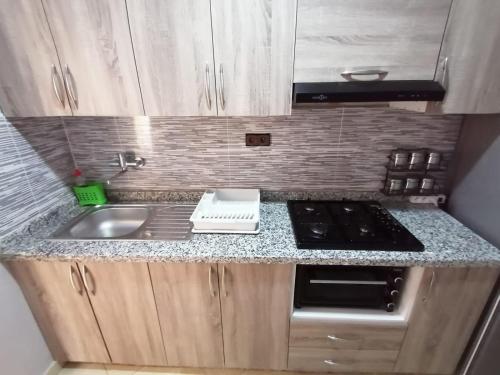 Η κουζίνα ή μικρή κουζίνα στο Appartements a Imi Ouaddar proche de la Plage