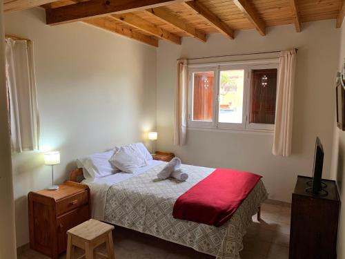 Postel nebo postele na pokoji v ubytování Casa Chiozza