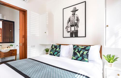 Ένα ή περισσότερα κρεβάτια σε δωμάτιο στο Villa Revo