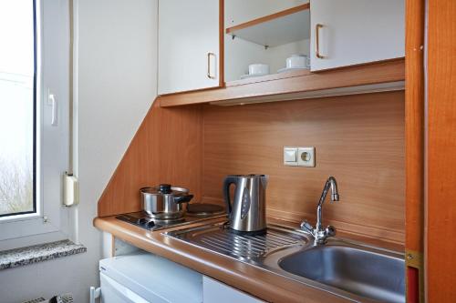 Micador Appartementhaus tesisinde mutfak veya mini mutfak