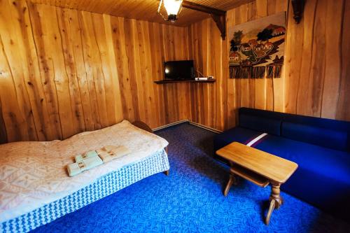 Ένα ή περισσότερα κρεβάτια σε δωμάτιο στο U Yaroslava Hotel