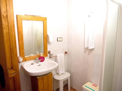 a white bathroom with a sink and a mirror at Elegant Villa in Archena + Private Pool in Archena