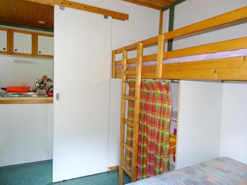 Postel nebo postele na pokoji v ubytování Bungalow Charmant à Pointe-Noire
