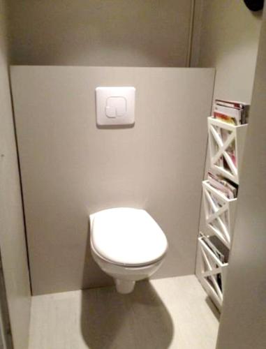Ένα μπάνιο στο Appartement moderne au cœur de Les Trois-Bassins avec jacuzzi