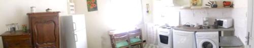 Kuchyň nebo kuchyňský kout v ubytování Appartement cosy au cœur de Bocognano avec vue sur montagne