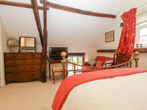 מיטה או מיטות בחדר ב-Colly Cottage