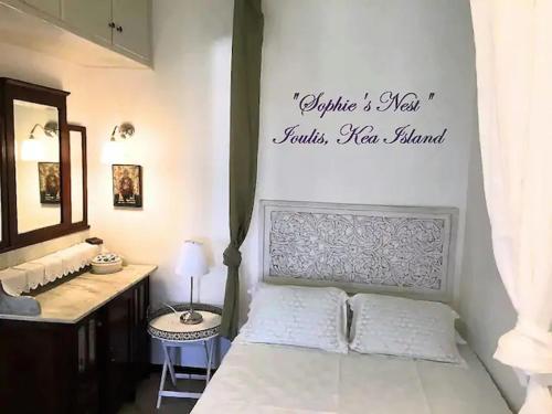 מיטה או מיטות בחדר ב-Sophie's Nest