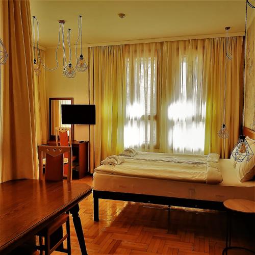 Katil atau katil-katil dalam bilik di СКЕРЦО SkerZZo Guest House