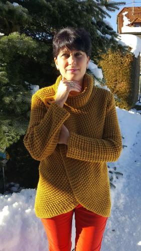 a woman wearing a yellow sweater and red pants at ferienhausfindling St.Lambrecht in Sankt Lambrecht