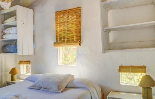 Ένα ή περισσότερα κρεβάτια σε δωμάτιο στο Azulado la Juanita Jose Ignacio