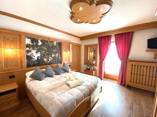 Postel nebo postele na pokoji v ubytování Hotel Laurino