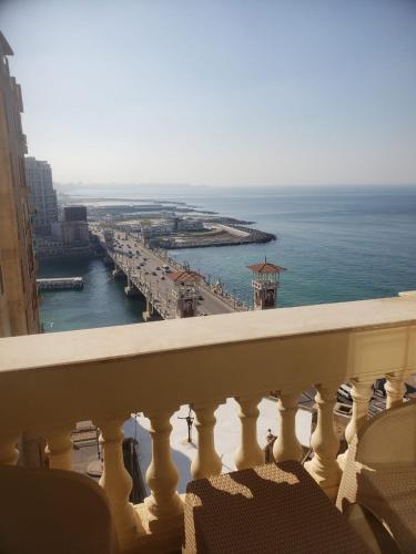 a view of the ocean from the balcony of a building at Stanley Bridge Apartment in Alexandria