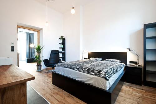 En eller flere senge i et værelse på Zentrales & modernes City-Apartment
