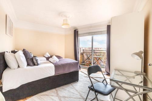 Voodi või voodid majutusasutuse CONEN Chafford Apartment toas