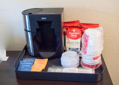 a container filled with food and other items on a table at Cobblestone Inn & Suites - Forest City in Forest City