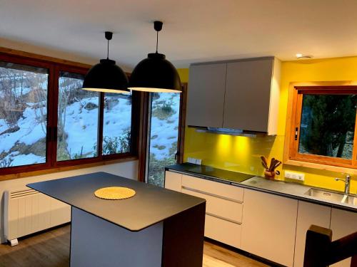 A kitchen or kitchenette at Chalet du Meilly