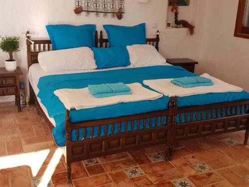 
A bed or beds in a room at Can Xica
