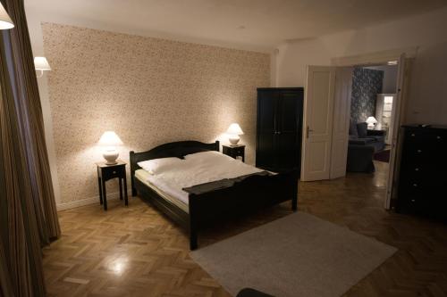 Кровать или кровати в номере Ister Guesthouse