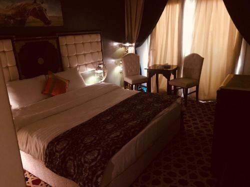 Postel nebo postele na pokoji v ubytování Omar Elkhaiam Hotel