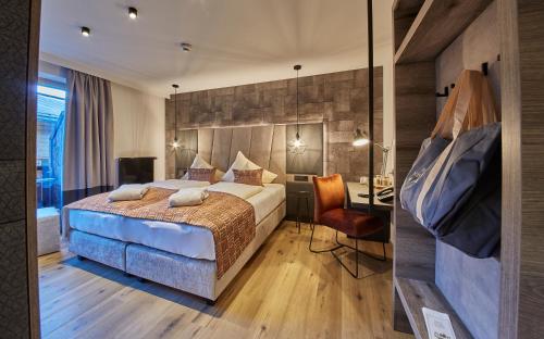 Posteľ alebo postele v izbe v ubytovaní Hotel Hasenauer 4 Sterne Superior