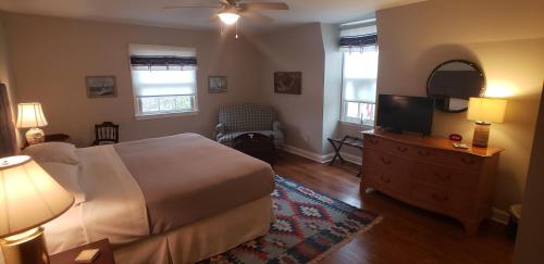 Ένα ή περισσότερα κρεβάτια σε δωμάτιο στο Miller-Dunham House B&B