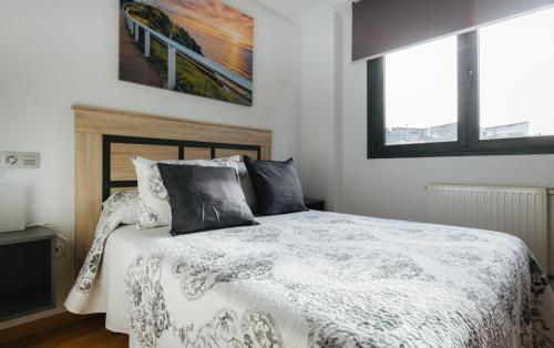 Postel nebo postele na pokoji v ubytování Apartamento MyM2