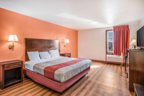 a hotel room with a bed and a window at Motel 6-Levittown, PA - Bensalem in Levittown