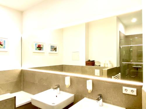 Et badeværelse på No.11 - 4 Zimmer Familien Apartment - Leipzig Suites